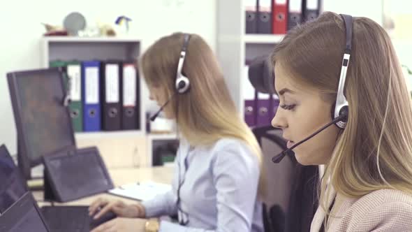 Call Center Agents Speaking with Customer