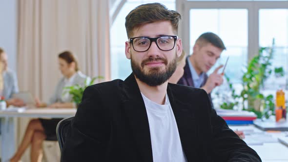 Charismatic Guy with Eye Glasses at the Training