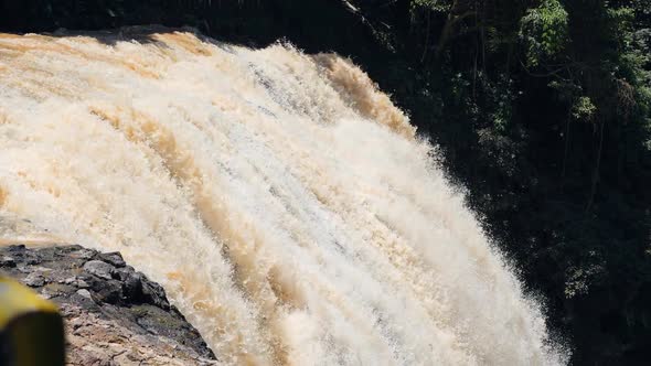 Close Up View of Flow of Incredible Strong Flow of Waterfall in Slow Motion.