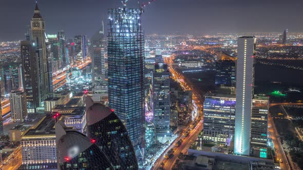 Skyline of the Buildings of Sheikh Zayed Road and DIFC Aerial Night Timelapse in Dubai UAE