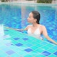Young asian woman enjoy around outdoor swimming pool for leisure - VideoHive Item for Sale