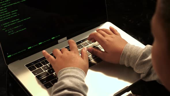 Boy Programmer Working On Laptop