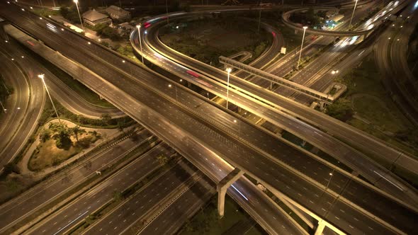 4K : Time lapse Aerial view and top view of traffic on city. Expressway with car lots