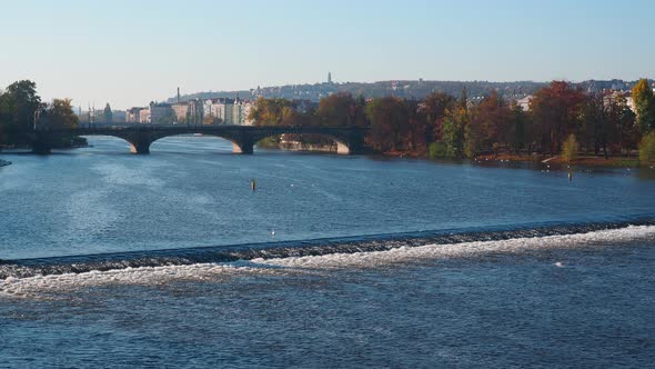 Huge water stream flows. Vltava River in Prague Czech Republic.