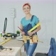 Female Carpenter Standing at Workbench - VideoHive Item for Sale