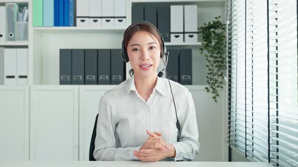 Asian beautiful woman video call with hr manager for job interview using laptop computer to discuss.