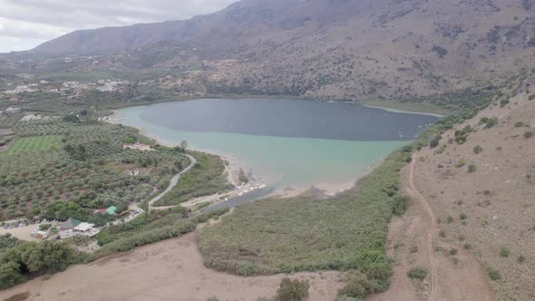 Aerial view of the lake among mountain cliffs. The landscape of Green canyon