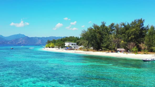 Aerial drone view seascape of beautiful tourist beach lifestyle by blue lagoon and white sand backgr