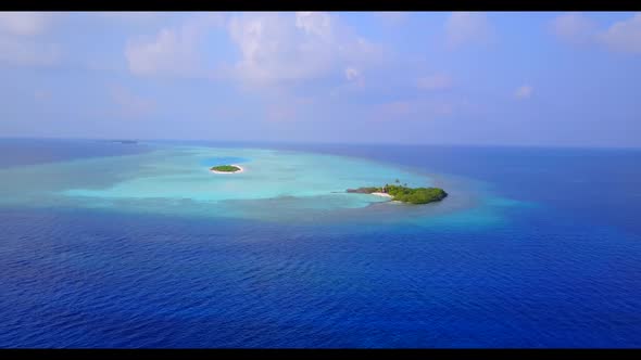 Aerial flying over nature of paradise resort beach adventure by transparent lagoon with white sand b