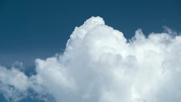 Timelapse of White Puffy Cumulus Clouds Forming on Summer Blue Sky