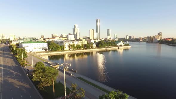 Ekaterinburg city. Lenin Avenue and pond on the river Iset. Aerial, summer, sunny