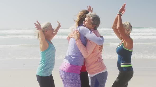 Athletic women having fun on the beach