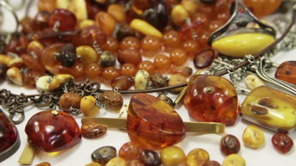 Amber Jewelry On White Background Closeup