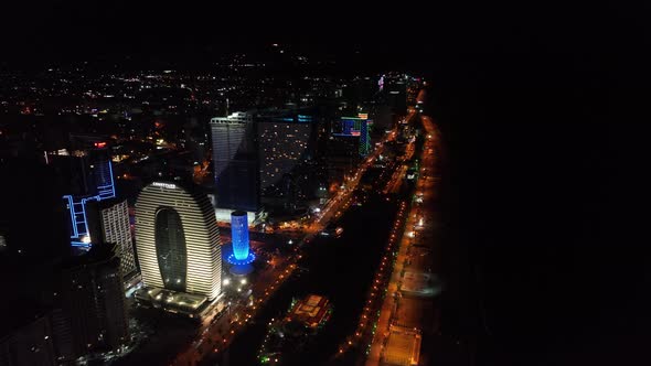 Batumi, Georgia - July 15 2022: Drone flies along new Batumi boulevard at night