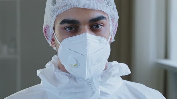 Sad Tired Arab Man Doctor Spaniard Practitioner Surgeon Wears Medical Protective Uniform Equipment