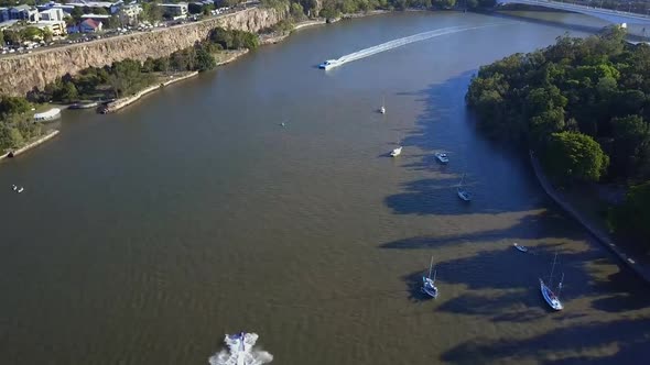 Aerial shot of City Cat and jet ski on Brisbane River, Queensland