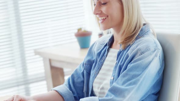 Businesswoman working over laptop at her desk