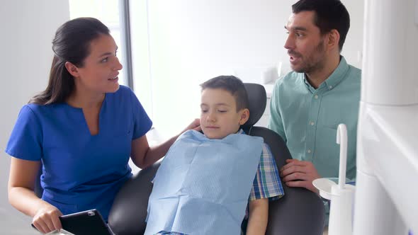 Female Dentist with Kid Patient at Dental Clinic 36