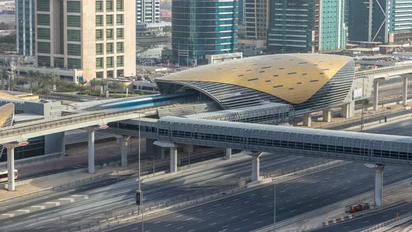 Aerial View of Metro Station Near Jumeirah Lakes Towers Skyscrapers Timelapse with Traffic on Sheikh