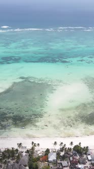 Tanzania  Vertical Video of the Ocean Near the Coast of Zanzibar Slow Motion