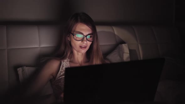 Business Woman Keyboarding on Laptop Computer Doing Job Overworking at Evening, Female Financial