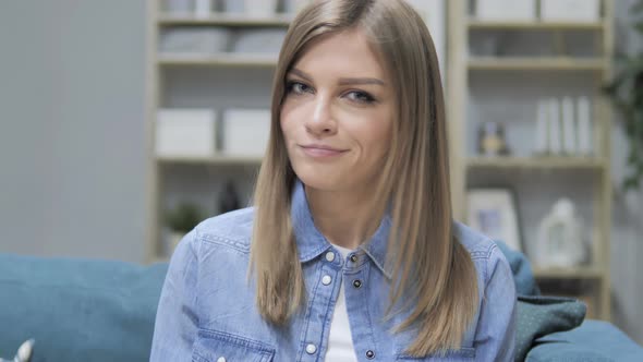 No, Young Girl Denying Offer By Shaking Head