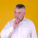 Elderly gray-haired man look at camera say hush be quiet with finger on lips shhh gesture - VideoHive Item for Sale