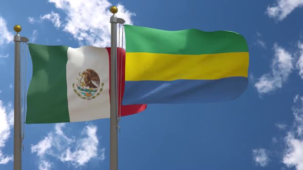 Mexico Flag Vs Gabon Flag On Flagpole
