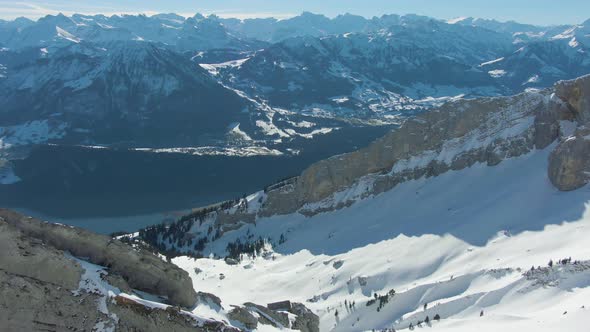 Ridge and Mountain Range on Background. Swiss Alps, Switzerland. Aerial View