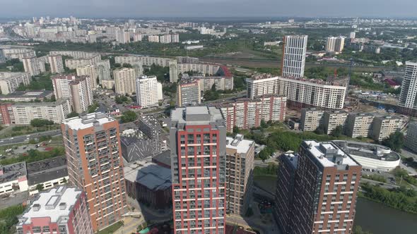 Aerial view of new modern high-rise buildings and old panel houses 04