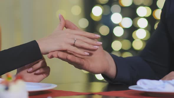 Close-up Man Holds Loved Girl Hand