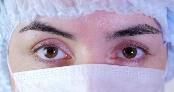 Portrait of a Close Up Woman Surgeon, Doctor With Mask Ready for Operation in Hospital or Clinic