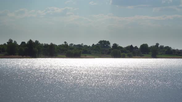 Sun Glare On The River In Nature