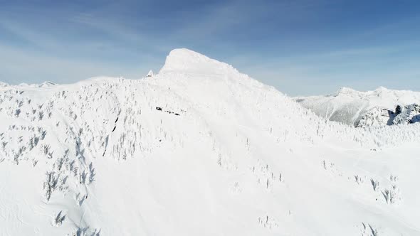 Snow capped mountain during winter 4k