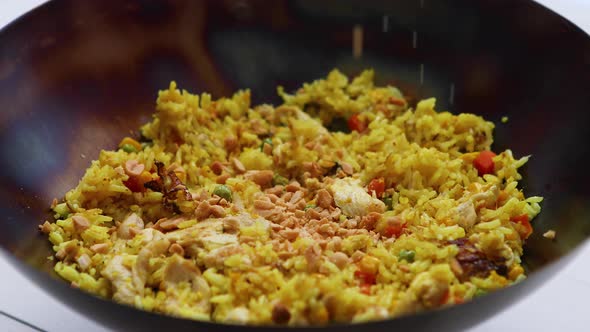 Delicious Thai Dish in Hot Wok Fried Chicken with Rice and Vegetables