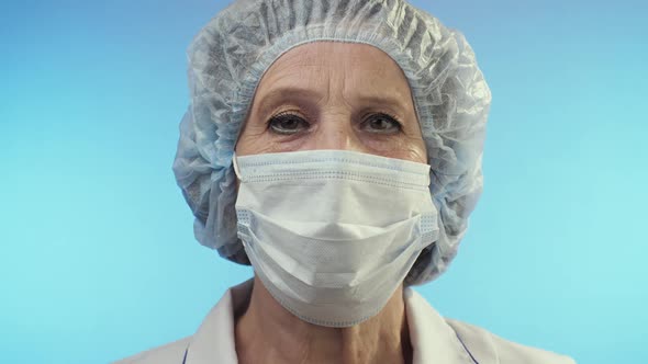 Portrait of Female Doctor in Surgical Mask