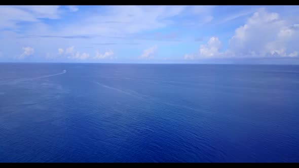 Aerial view texture of perfect island beach lifestyle by blue green lagoon with white sandy backgrou