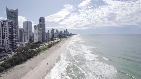 Flying On The Sandy Beach With Coastal Road At The Surfers Paradise In Gold Coast, Queensland, Austr