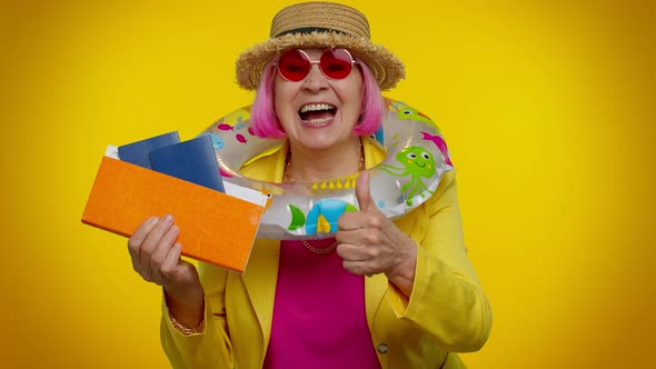 Traveler Tourist Senior Woman Holding Passport Tickets Dreams of Which Country to Go Rest Celebrate