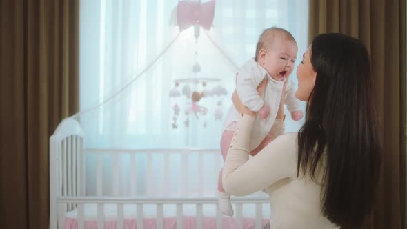 In the Bedroom Cute Little Baby Girl Speeding Time