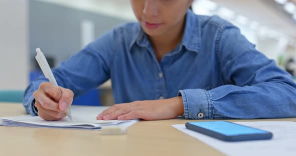 Woman study at library