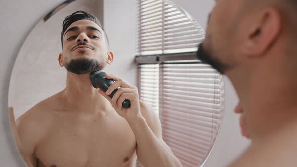 Back View From Behind Male Reflection in Mirror in Bathroom Naked Guy Bearded Indian Arab Man