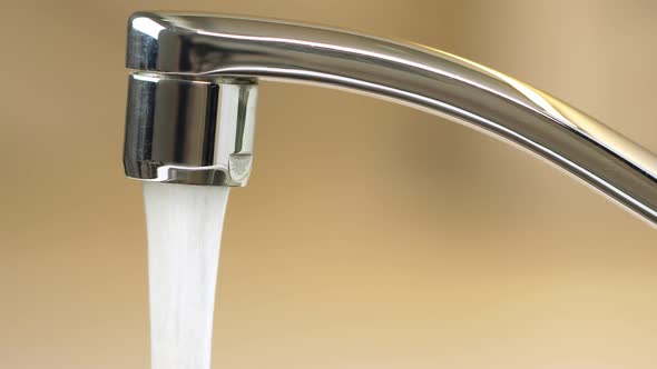 Water Running From Faucet Closeup
