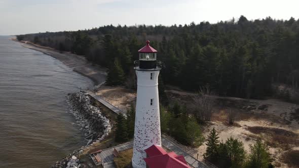 4k drone video of Crisp Point Lighthouse in Michigan during the fall.