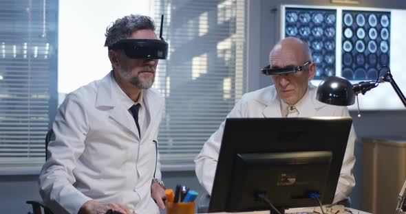 Doctors Watching Screen Using Virtual Reality Headset