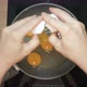 Fresh Eggs Break in Hot Frying Pan on Stove - VideoHive Item for Sale