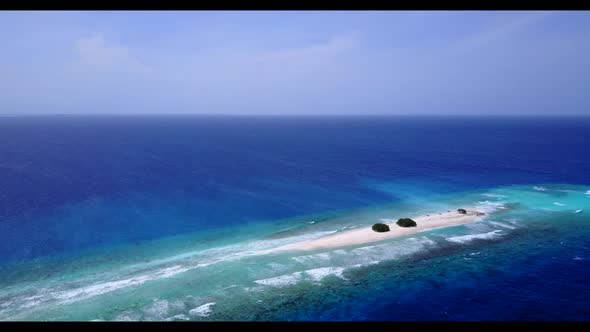 Aerial drone sky of tranquil sea view beach adventure by blue ocean and white sand background of a d