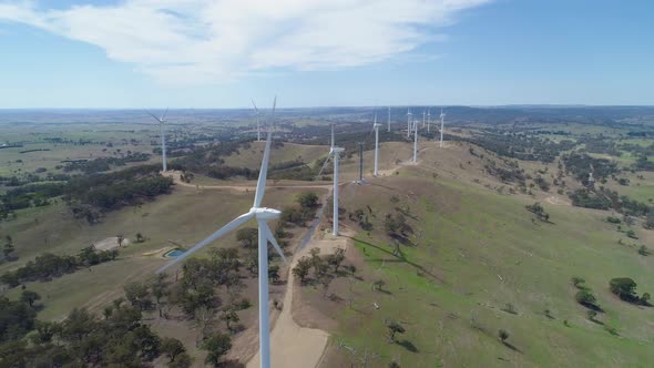 Flyover Wind Farm in Australian Countryside on Bright Summer Day