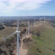 Flyover Wind Farm in Australian Countryside on Bright Summer Day - VideoHive Item for Sale