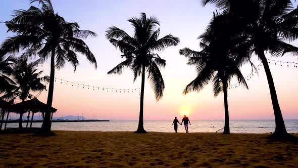 NaJomtien Pattaya Thailand Hammock on the Beach During Sunset with Palm Trees